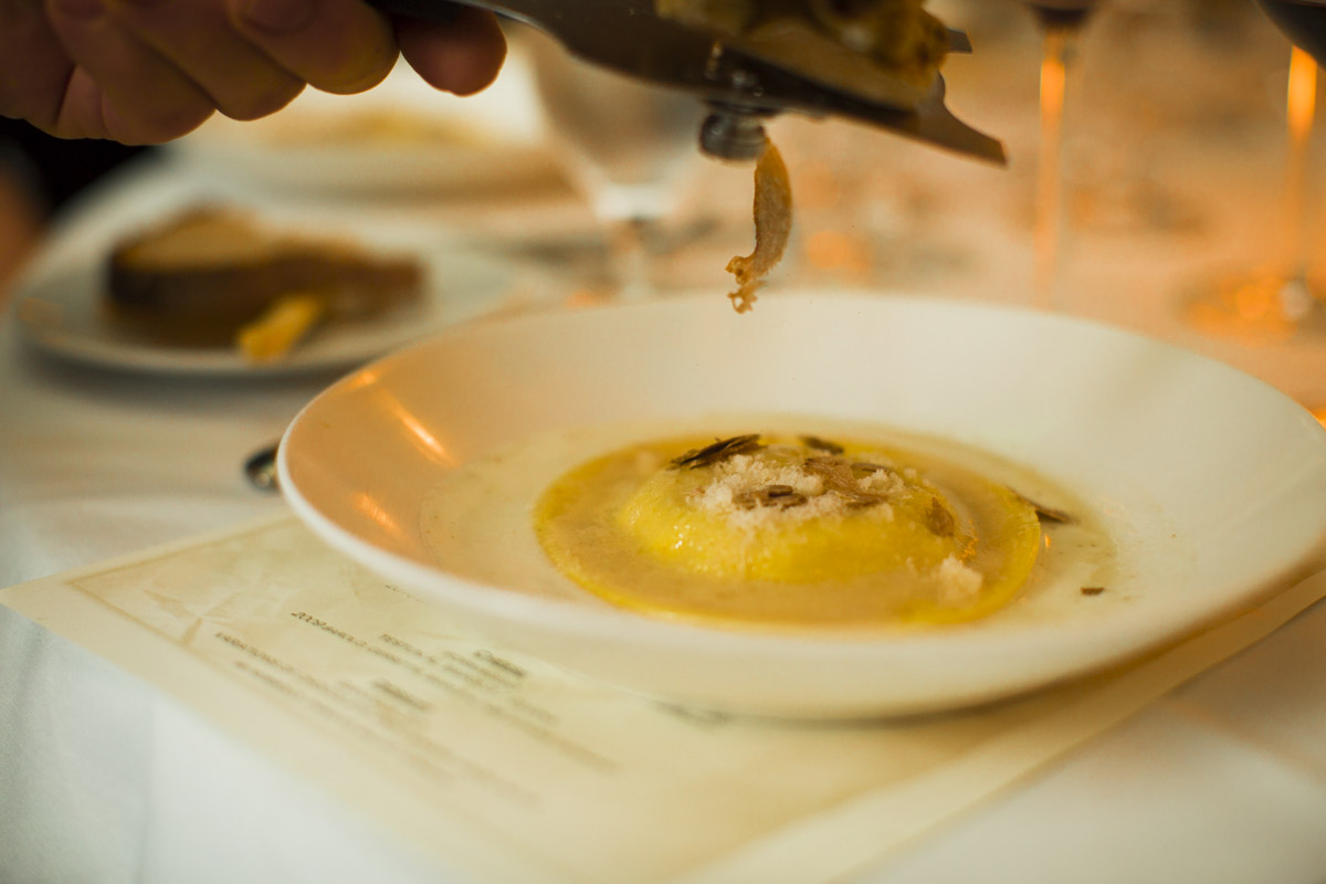 large raviolo in a dish